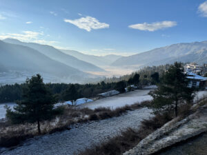 Scenic views over a stunning, misty valley, seen on our luxury Bhutan travel tour | EPIcURIOUS travel
